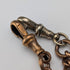 Antique British rolled gold double Albert chain with brass key fob